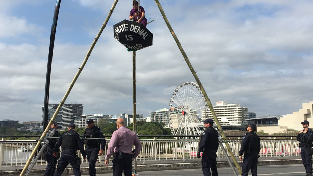 The protest on Monday involved a structure on Victoria Bridge from which a woman dangled.