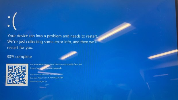 A computer showing a blue screen.