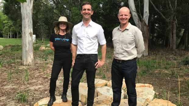 Federal Brisbane MP Trevor Evans (LNP) with Healthy Land and Water scientists Rachel Nasplezes and Dr Paul Maxwell at Newmarket.