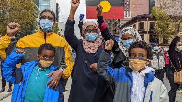 Ezi Osman at Melbourne's Black Lives Matter protest with her family. 