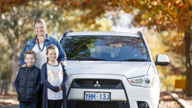 Emma Edmeades, one of the first Shebah drivers in Canberra, with her children Finnley, 7, and Chloe, 9. 