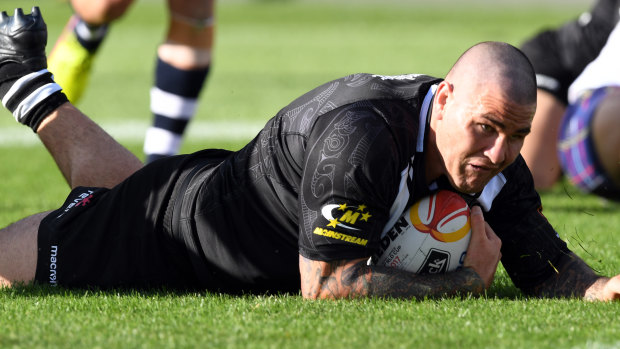 Never again: Russell Packer of New Zealand scrambles across to score for New Zealand.