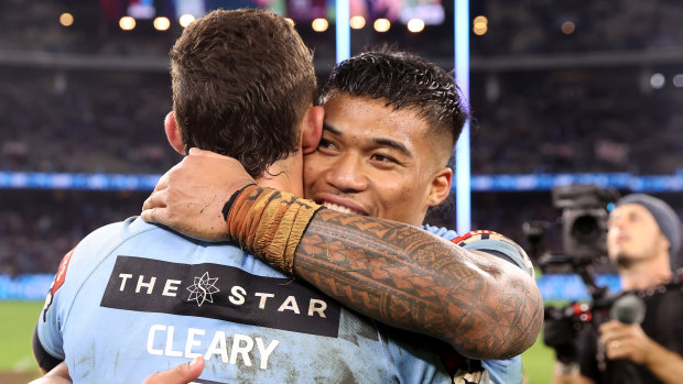 Brian To’o celebrates with Panthers teammate Nathan Cleary. 