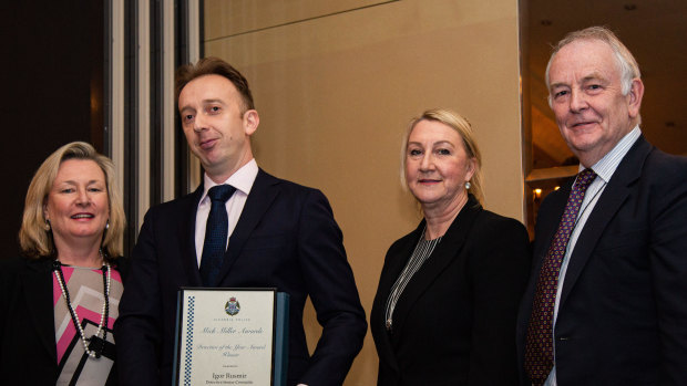 Senior Detective Igor Rusmir receives  the Mick Miller Detective of the Year Award from Assistant Commissioner Tess Walsh (left), Deputy Commissioner Wendy Steendam and Mick Miller's son Geoff.