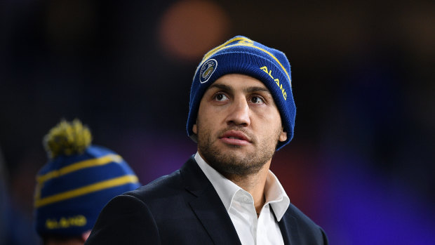 Blake Ferguson watches on from the sideline during the Eels' clash with the Knights at Bankwest Stadium.