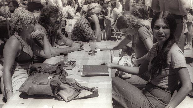 Jim Cairns (centre, face obscured) and Junie Morosi (right) by the pool at the 1975 ALP conference in Terrigal.