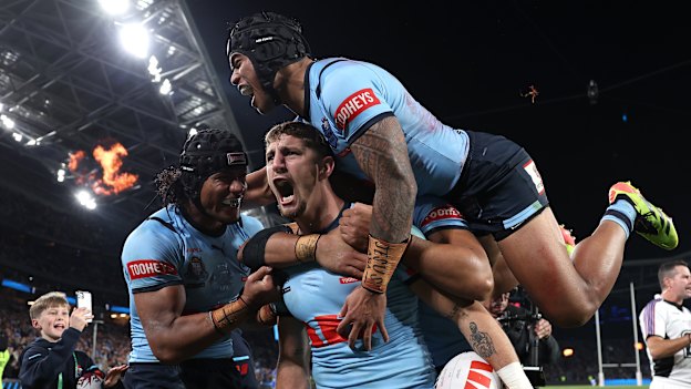 Zac Lomax celebrates his first Origin try.