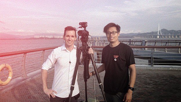 Bill Birtles, at left, with Beijing-based cameraman Steve Wang.