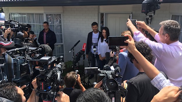 Ardern with partner Clarke Gayford in January, announcing her pregnancy outside their home.