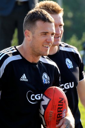 Dane Swan and Nathan Buckley at Pies training in 2012. 