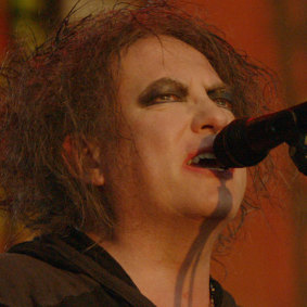The Cure's Robert Smith on stage in Hyde Park, London, for the band's anniversary concert in 2018.