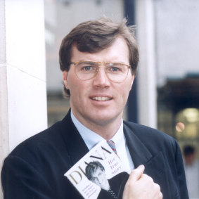 Andrew Morton, biographer of Diana, Princess of Wales, holding his book Diana: Her True Story in 1997.