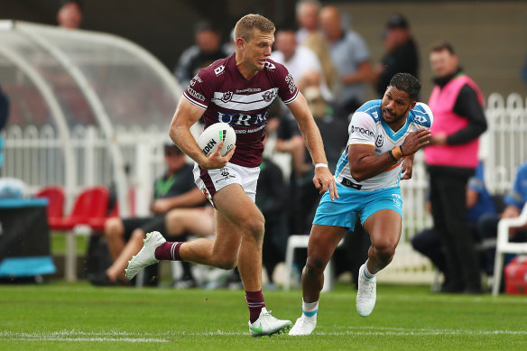 Tom Trbojevic bursts into the clear on the way to scoring a try against the Titans in Mudgee in his first game in 2021.