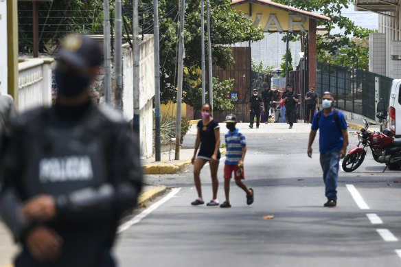 Security forces leave a facility in Macuto, Venezuela, on Sunday. Interior Minister Nestor Reverol said on state television that Venezuelan forces overcame an armed maritime incursion by boats through the port city of La Guaira from neighbouring Colombia on Sunday.