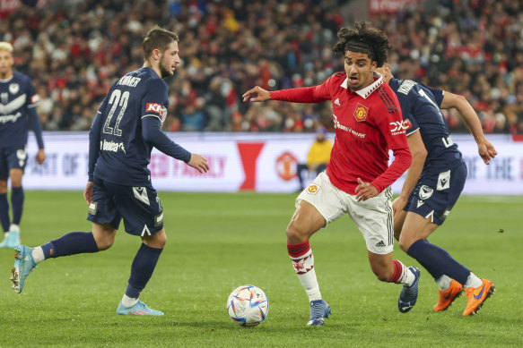 Manchester United surge forward in their game against Melbourne Victory at the MCG in July.