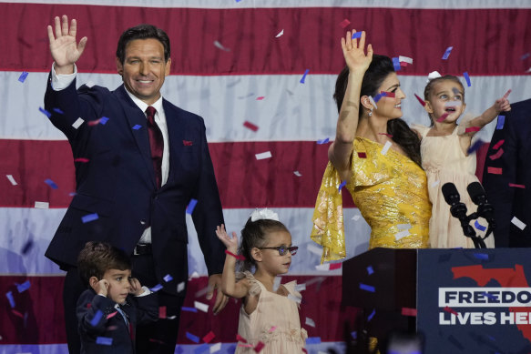 Ron DeSantis, his wife Casey and their children on stage after his win in the midterm elections.
