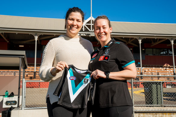 Port Adelaide AFLW senior coach Lauren Arnell (right) and partner Lexi Edwards.