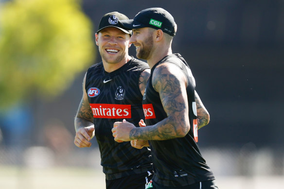 Jordan De Goey (left) with teammate Jeremy Howe at Magpies training on Friday.