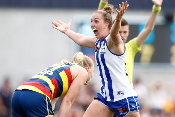 Emma King celebrates North Melbourne’s dramatic one-point win in the preliminary final against Adelaide.