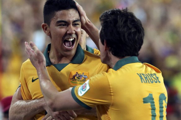 Massimo Luongo celebrates with Robbie Kruse after scoring in the Asian Cup final against South Korea at Stadium Australia in 2015.