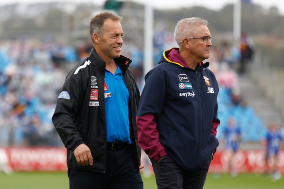 Former Hawthorn employees and now opposition coaches: Clarkson and Fagan, pictured in April last year.