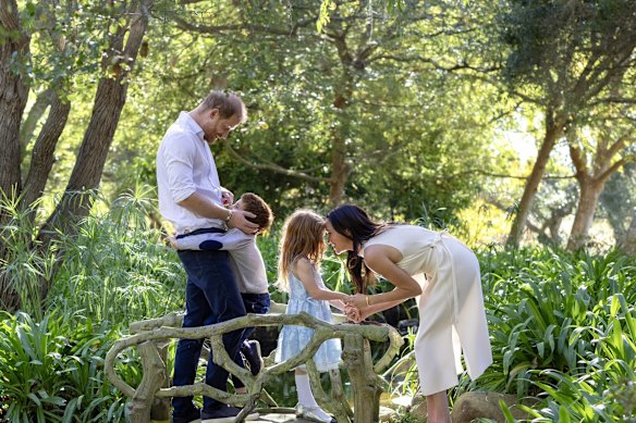 Harry and Meghan with Prince Archie and Princess Lilibet in December.