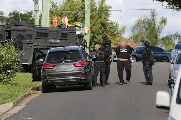 Comancheros bikie boss amongst eight arrested as weapons, drugs and ...