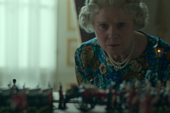 Queen Elizabeth II (Imelda Staunton) studies the elaborate plans for her own funeral, code-named Operation: London Bridge, in The Crown.