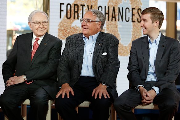 Warren Buffett with son Howard G. Buffett and grandson Howard W. Buffett.