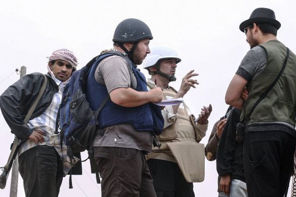 American journalist Steven Sotloff (second from left) in Libya in 2011, before his kidnapping in Syria in 2013.