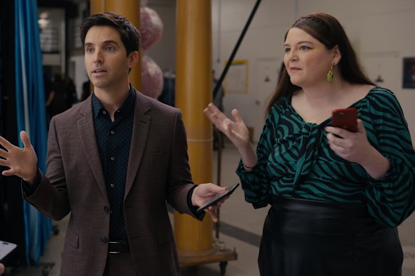 Paul W. Downs and Megan Stalter in a scene from Hacks.