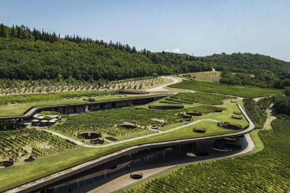 The tiered structure is almost invisible, but for a couple of slits in the hillside.