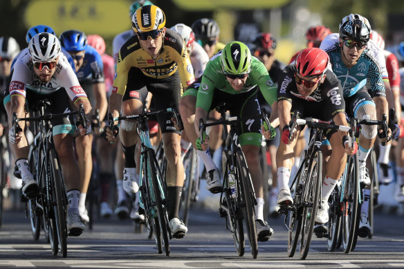 Caleb Ewan, right, goes to wheel to wheel with Irish rider Sam Bennett at the end of stage 11.