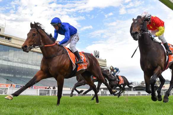 Damien Oliver aboard Anamoe charges to victory.