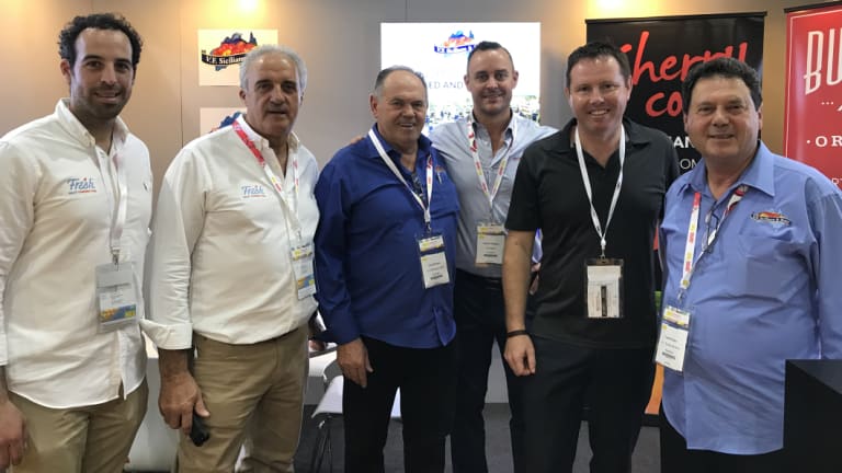 Andrew Broad pictured with Australian fruit producers at a conference in Hong Kong.