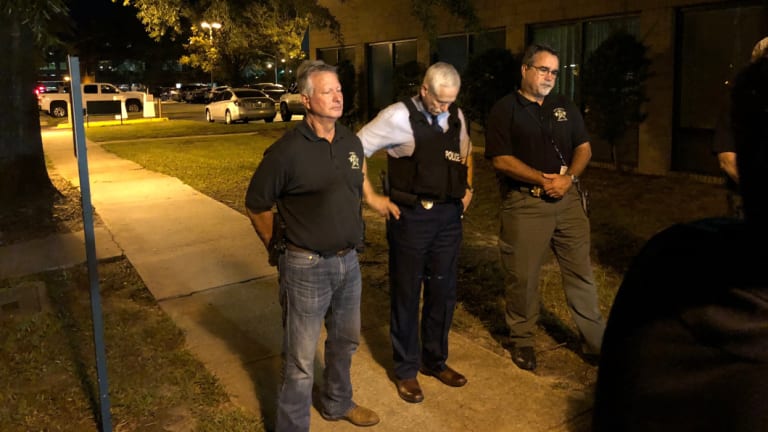 Florence County sheriff Kenney Boone, Florence police chief Allen Heidler and Florence County chief deputy Glenn Kirby speak to the media.