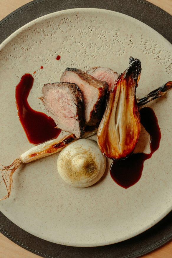 Black Angus with new-season alliums.