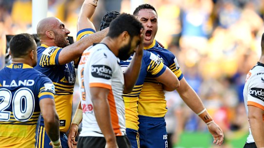 Tough day out: The debut of Bankwest Stadium was an afternoon to forget for Robert Jennings and Wests Tigers.