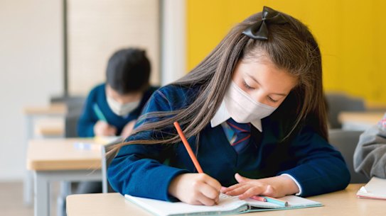 It is “strongly recommended” that students aged eight and over wear masks when indoors.
