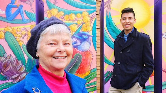 Photo of local resident, Laura Brinson with Yarra Energy Foundation, Tim Shue posing next to a battery that has been  painted by artist Hayden Dewar in Fitzroy North on Thursday 23 June 2022. Photo Luis Enrique Ascui