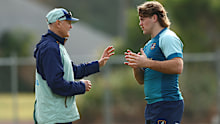 Joe Schmidt and Fraser McReight talk during a Wallabies training session.