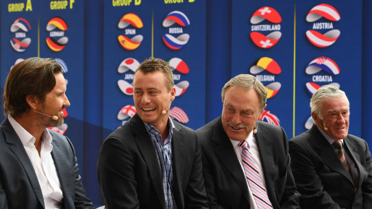 Pat Rafter (left), Lleyton Hewitt, John Newcombe and Ken Rosewall chat at the ATP Cup draw. 