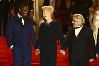 Idris Elba, Tilda Swinton and George Miller pose at Cannes.