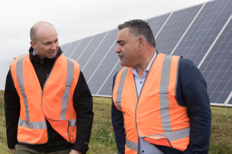 NSW Energy and Environment Minister Matt Kean (left), visits a solar farm near Dubbo in August with the state's Nationals leader and Deputy Premier John Barilaro.