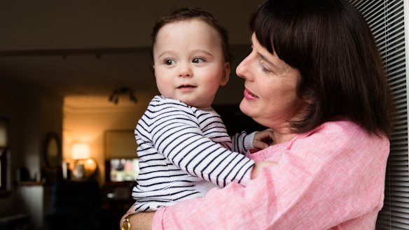 Amanda Conroy with her toddler Augie. Amanda lost her own mother shortly before becoming a mother herself.