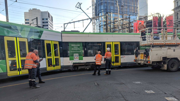 Derailed tram on the intersection of Flinders and Spencer streets. 