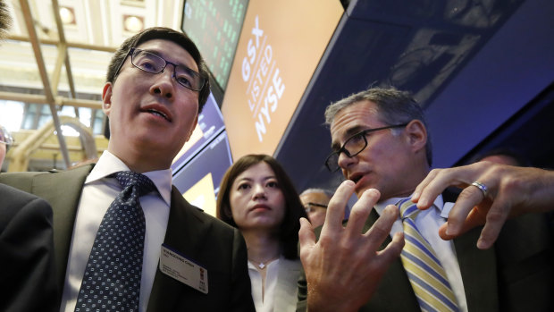 Larry Chen is maintaining a cheerful outlook despite seeing his fortune plummet. 