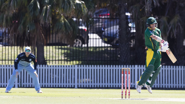 David Warner bats, Steve Smith fields, in Sydney club cricket.