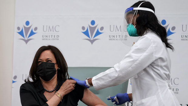 Vice-President-elect Kamala Harris receives the Moderna COVID-19 vaccine from nurse Patricia Cummings at United Medical Center in southeast Washington. 