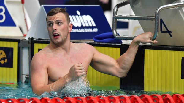Pretty special: Kyle Chalmers checks out the clock after winning the 100m freestyle.